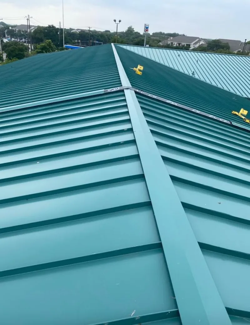 Green commercial metal roof ridge and valley for Metal Roof Repair in Boone